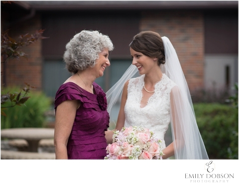 mother and daughter giggling