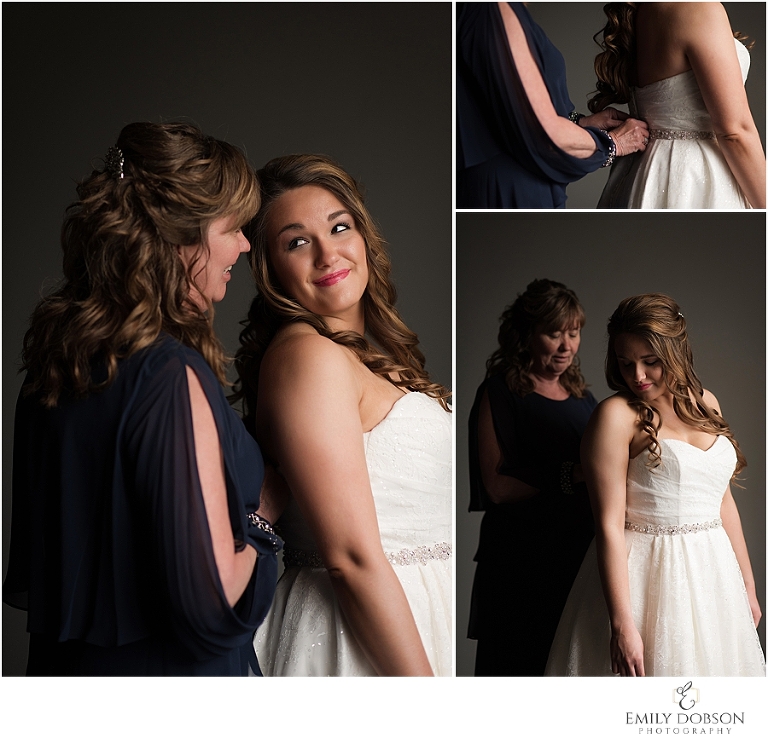 Bride getting dressed with her mom